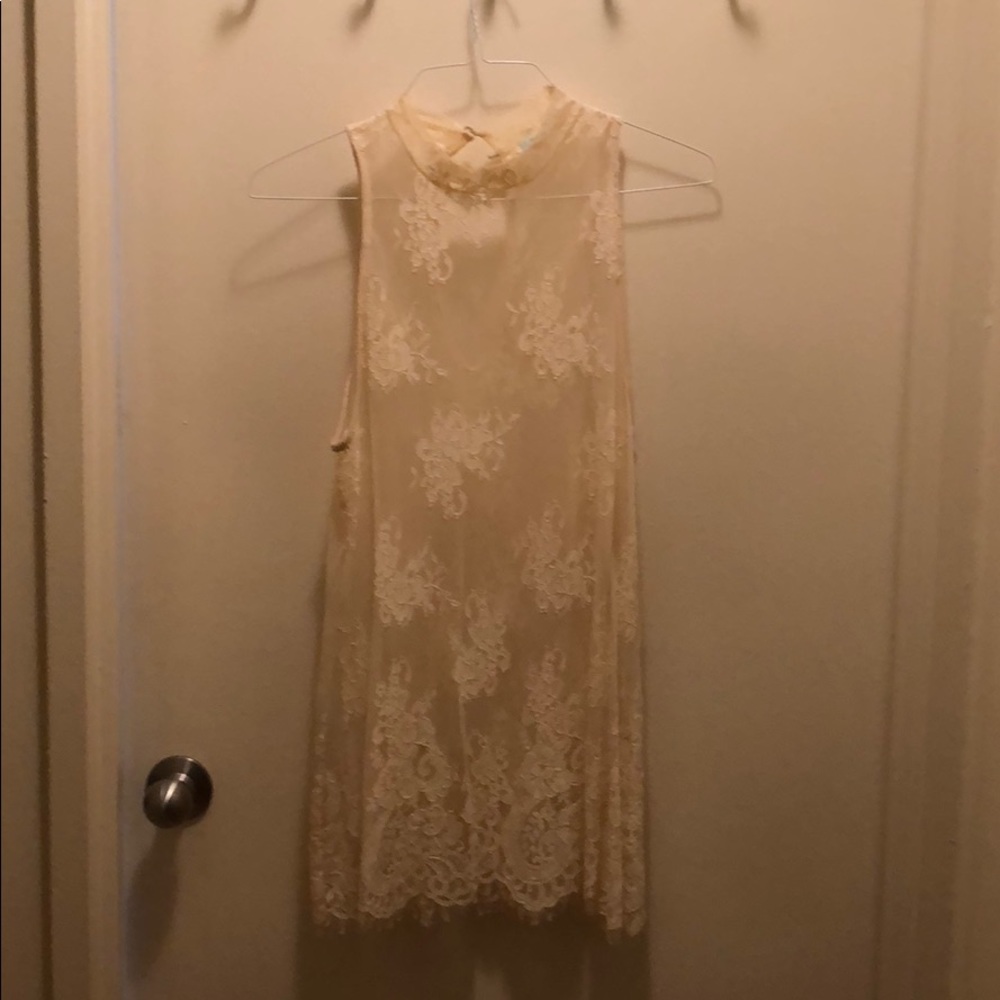 Lace , sleeveless long top.